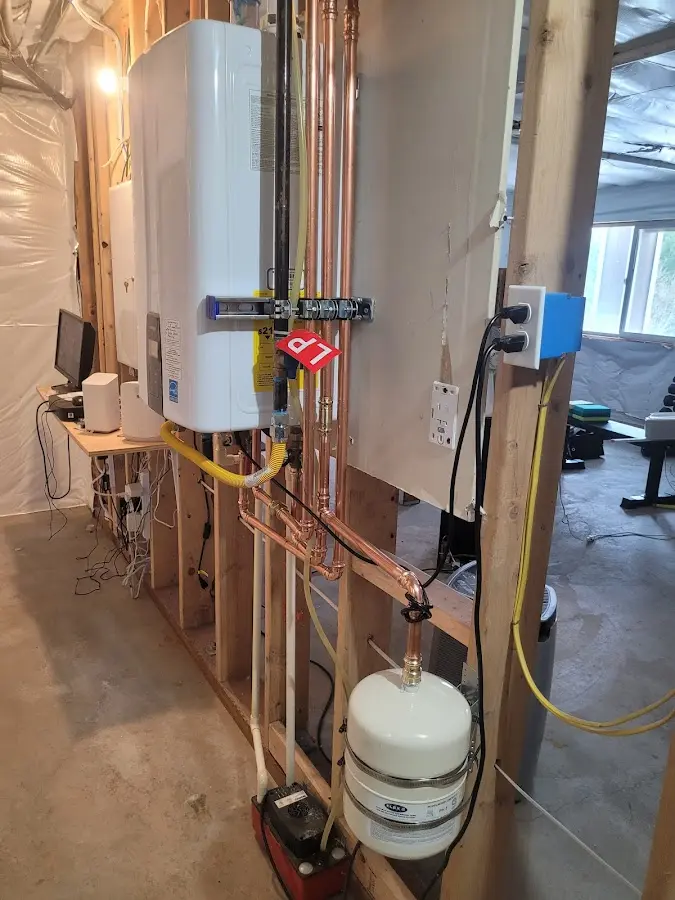 Licensed plumber repairing a kitchen sink in Bloomingdale